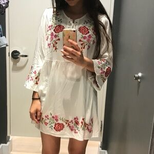 Beautiful white floral dress with shoelace design
